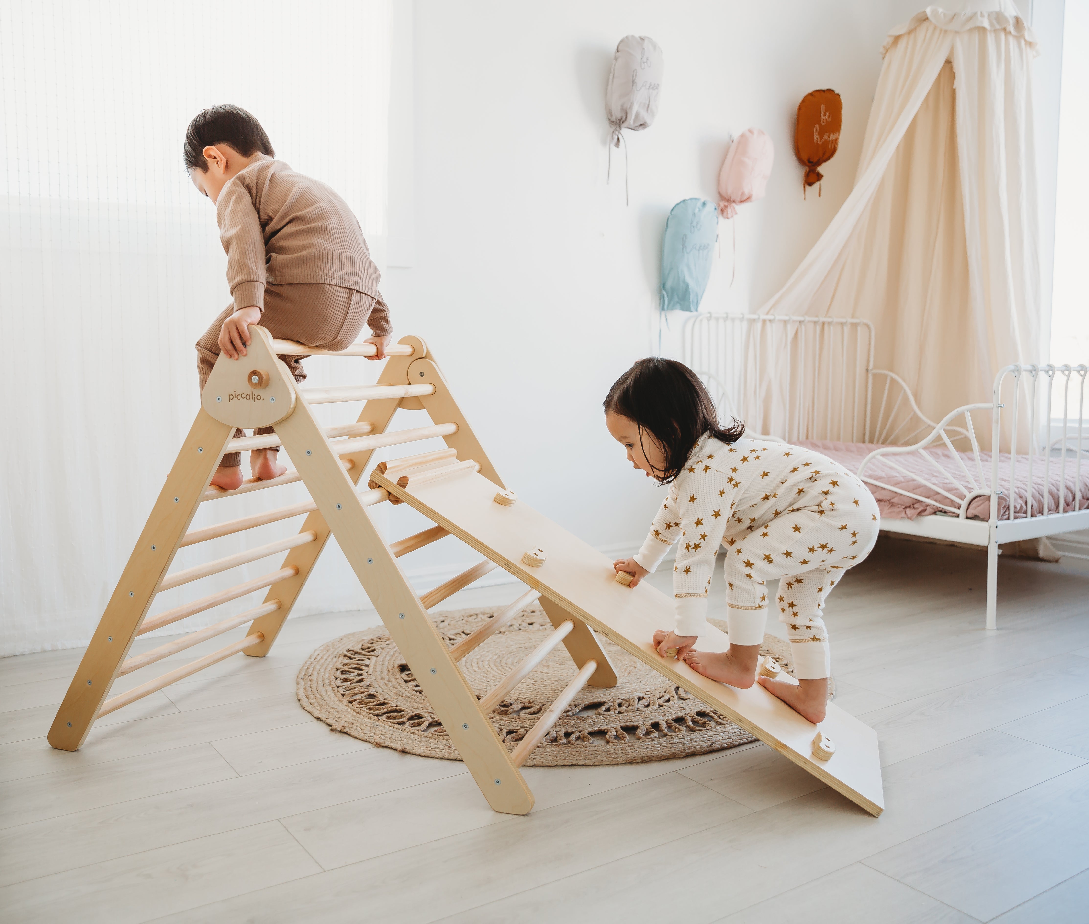 Boy and girl climbing on the Pikler Triangle, best Pikler triangle