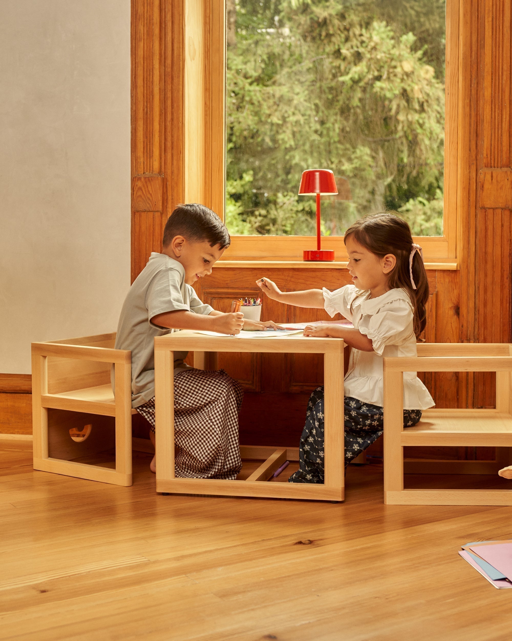 Children sitting at Montessorit table and chair, Montessori furniture, toddler table and chair