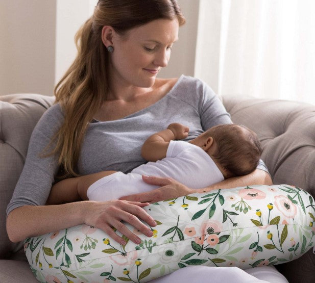 Baby sleeping on nursing pillow hotsell