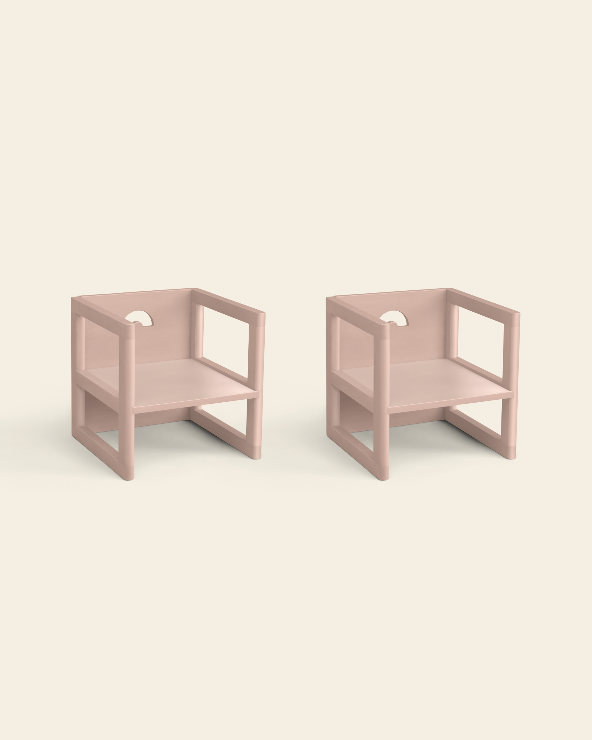 Two wooden children's chairs in pink color