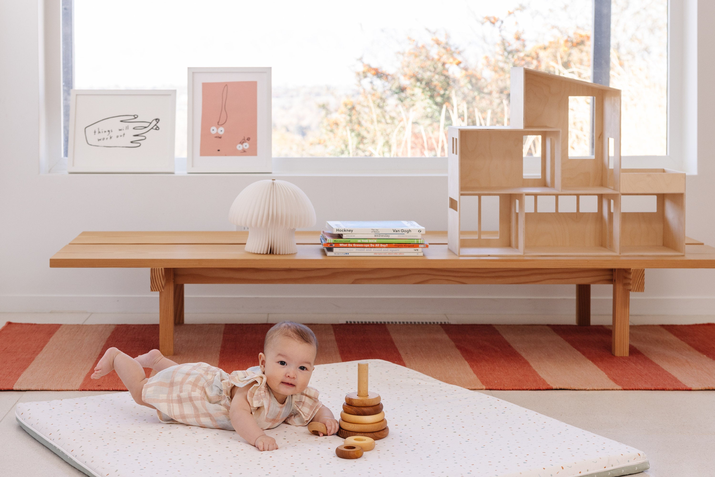 baby playing on the non-toxic play mat