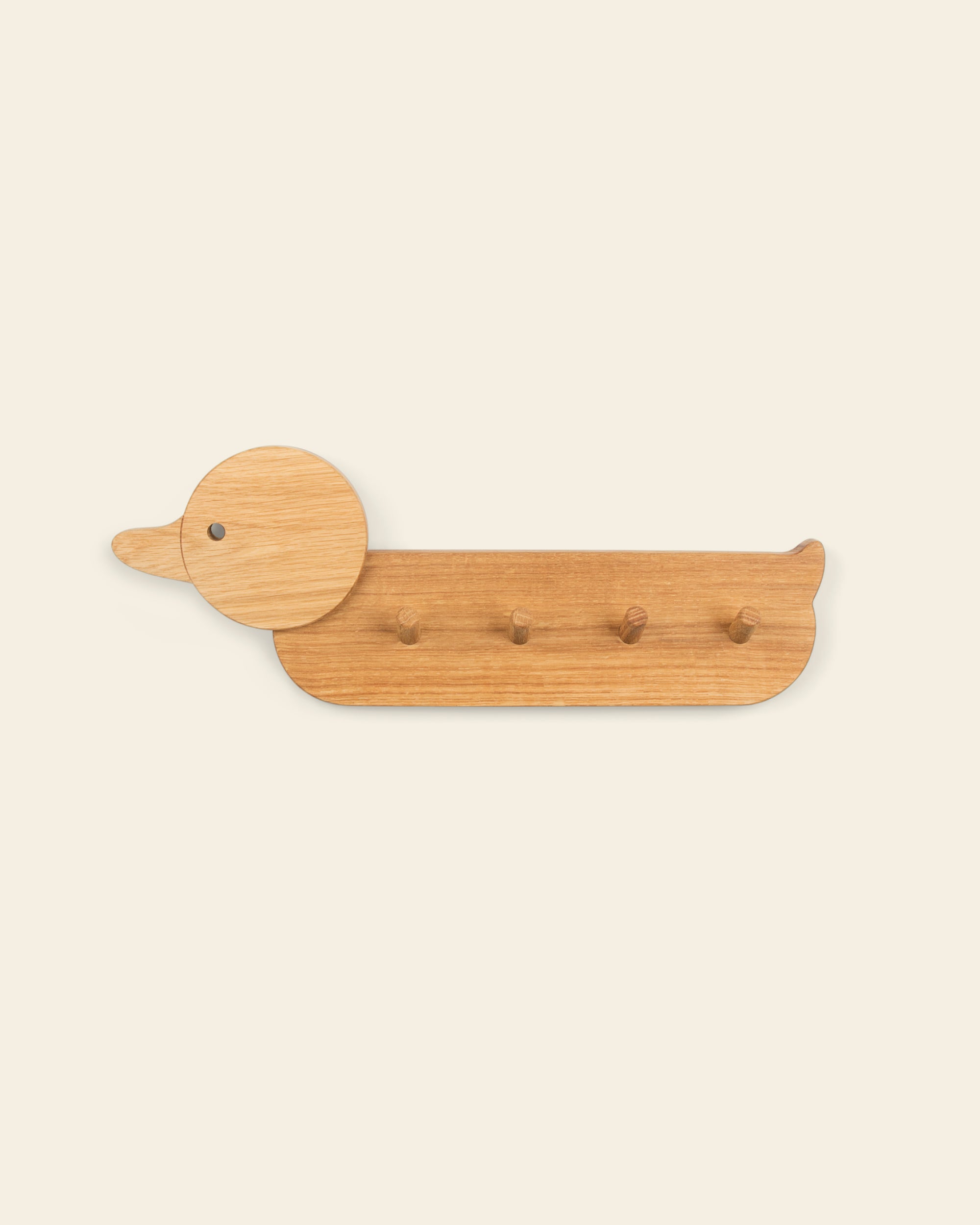 Piccalio Coat Rack for children featuring four hooks in the shape of a duck made of non-toxic natural oak wood