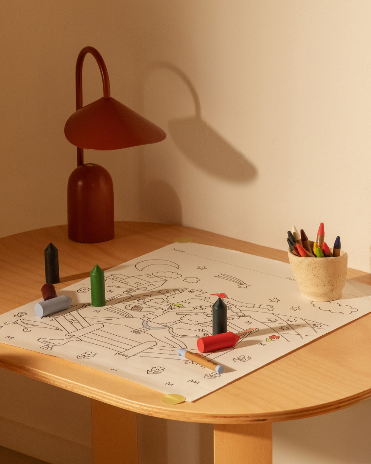 Piccalio Large Coloring Page and Beeswax Crayons on the Kids Table made of beech wood
