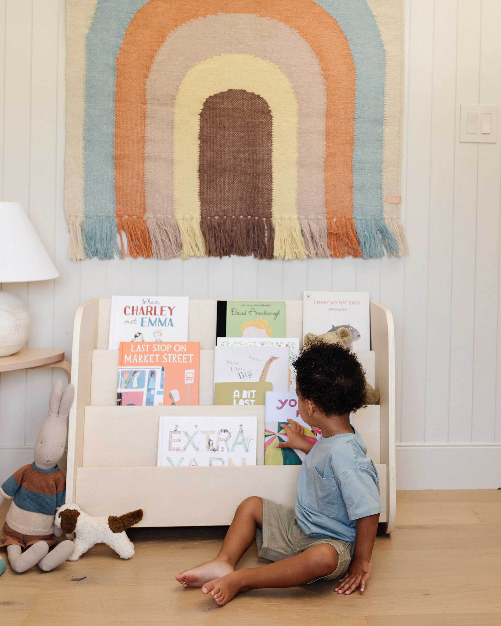 kids books on wooden bookshelf