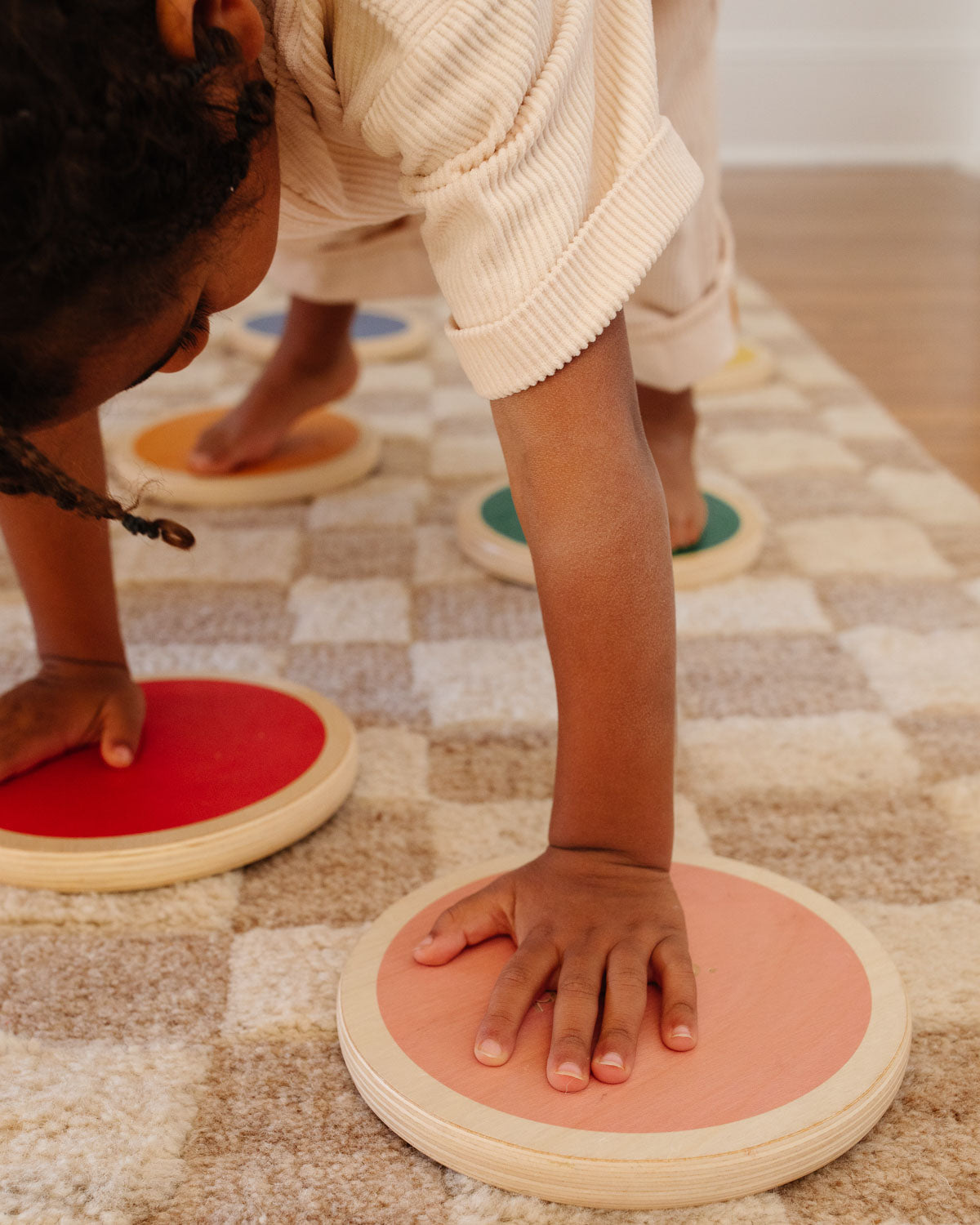 child playing with stepping stones