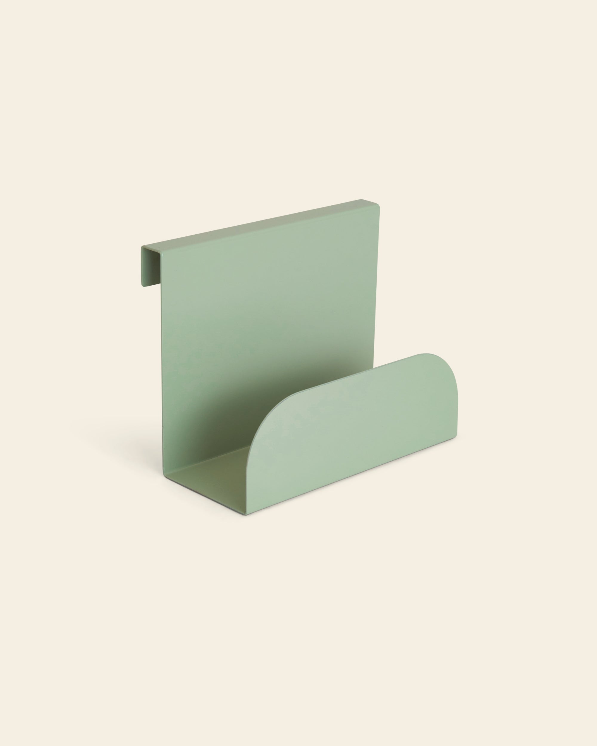 Piccalio bed book hook made of metal in sage green color used on a Piccalio Montessori bed to store books.