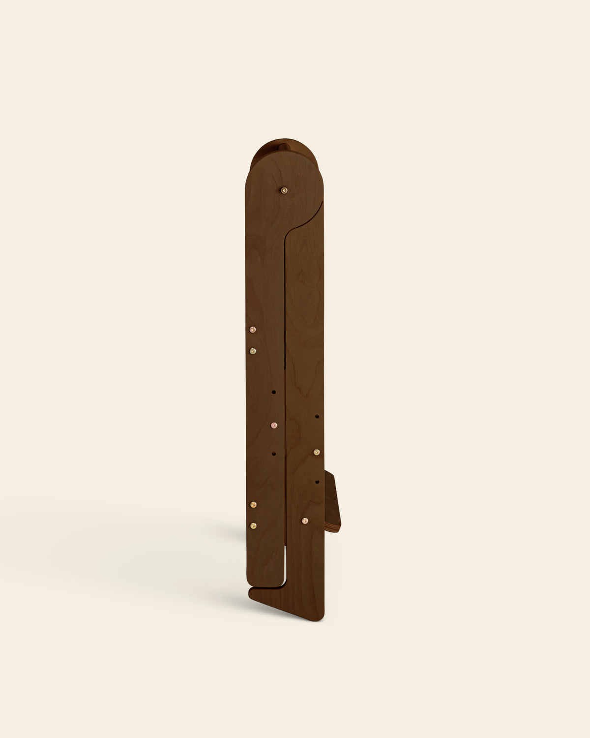 A folded view of the Piccalio Foldable Toddler Tower in a walnut stain, measuring 6.3 inches when folded.