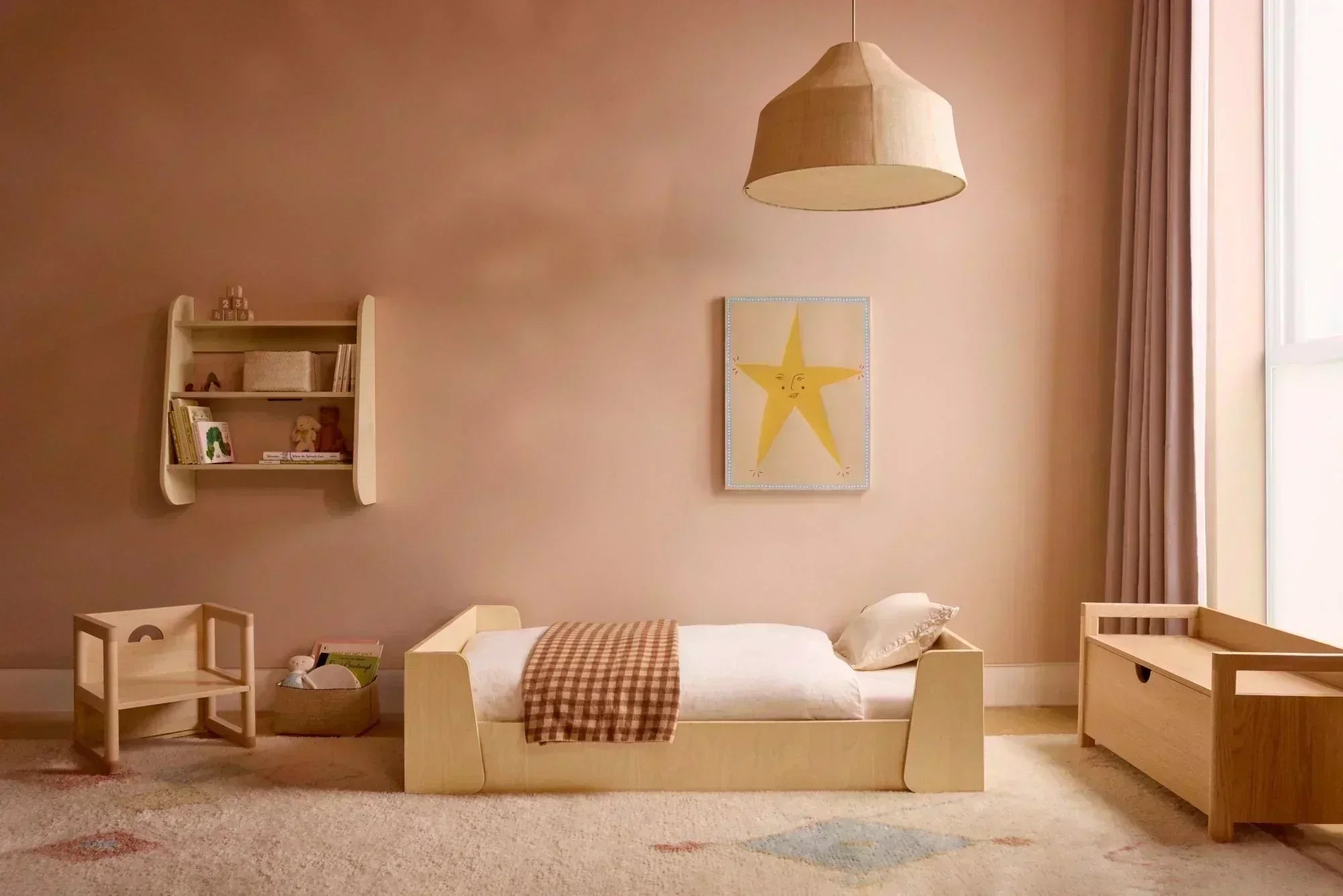 Modern bedroom with Piccalio non-toxic children's furniture including bed, toy box, chair, and wall shelf