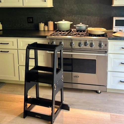 Piccalio convertible helper tower in a black finish in a modern kitchen.