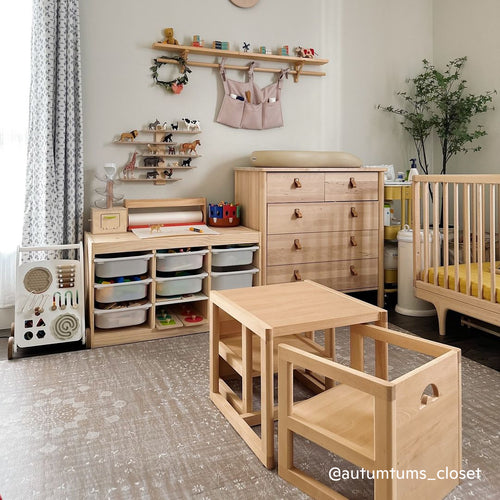 Piccalio children's table and chair set in natural beech wood in a toddler nursery.