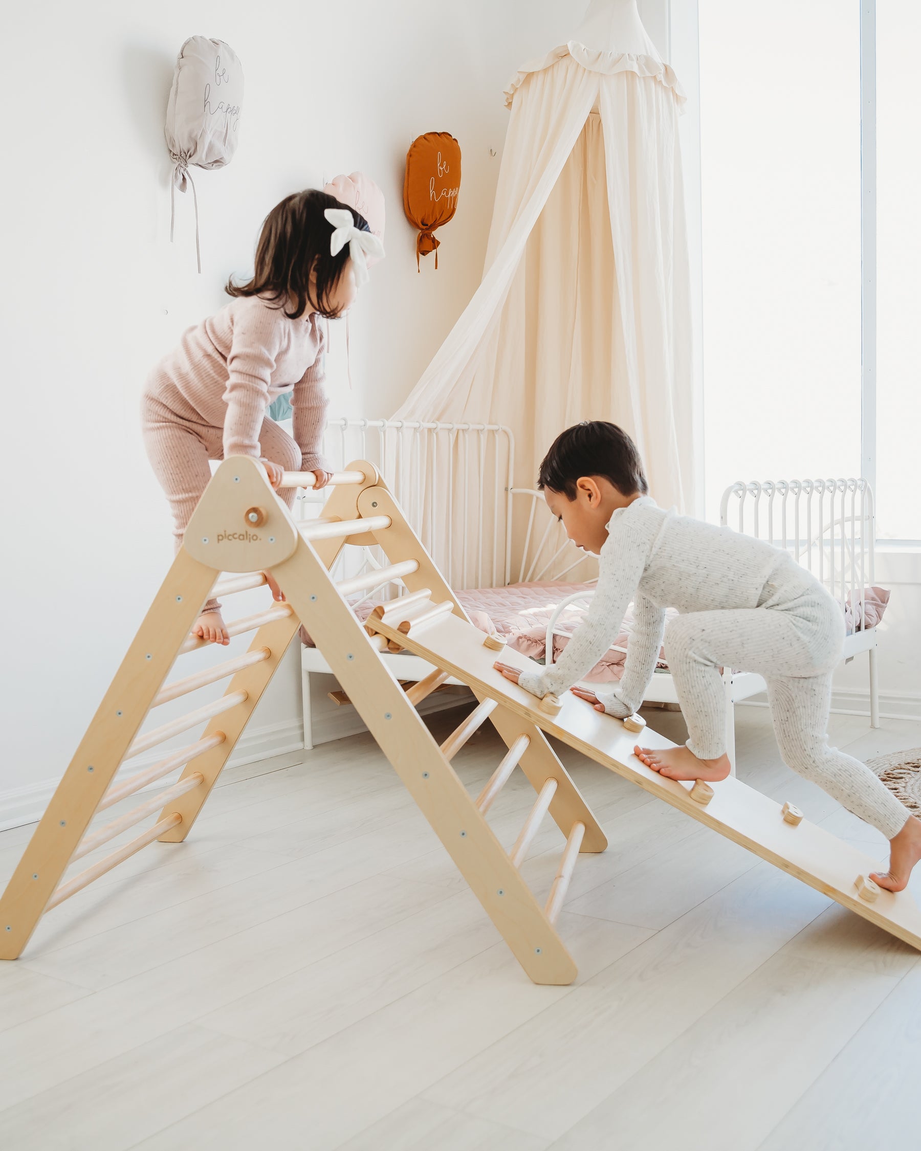 children climbing wooden toys