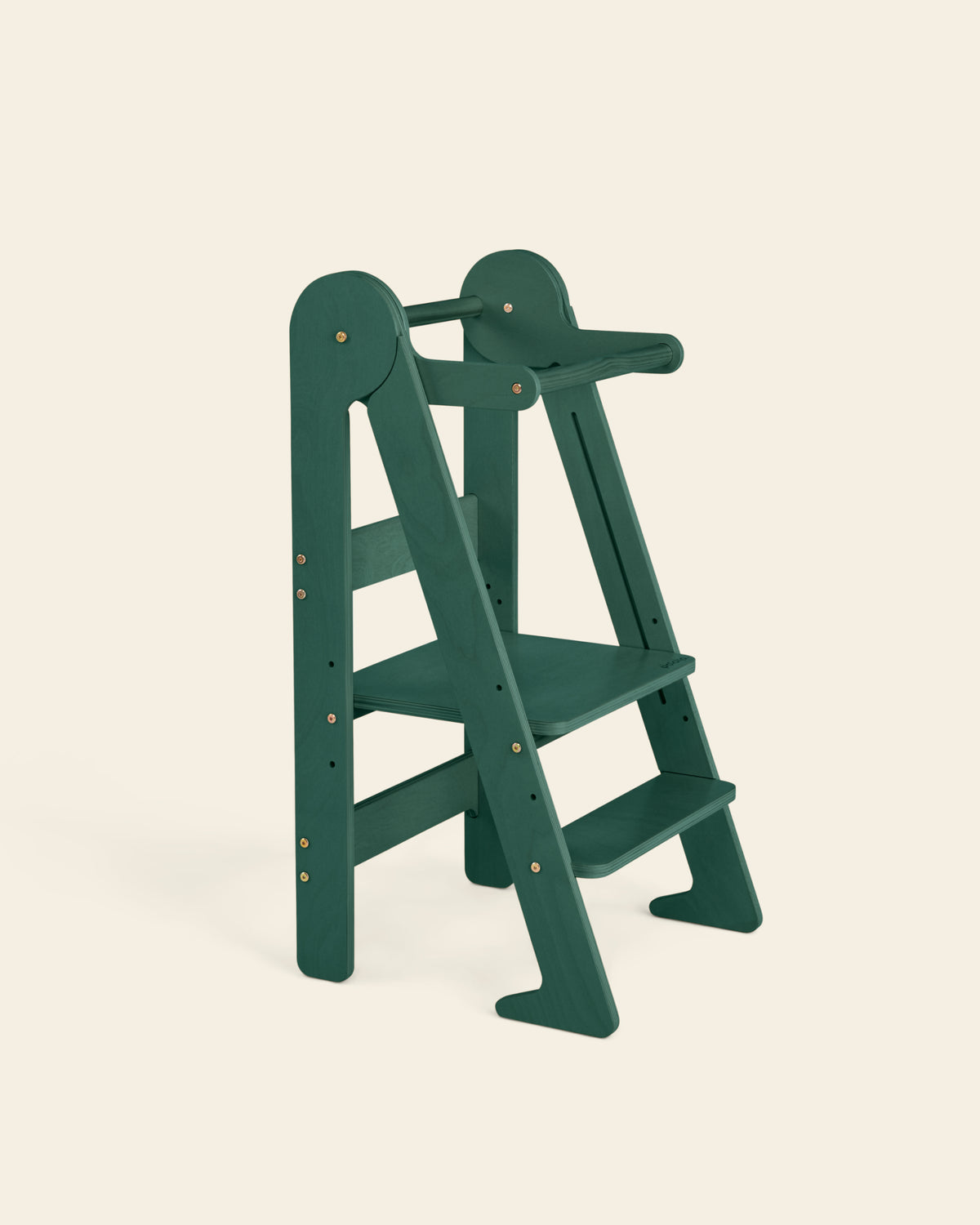 Piccalio Foldable Toddler Tower in a limited edition dark green color made of natural wood and a non-toxic finish.
