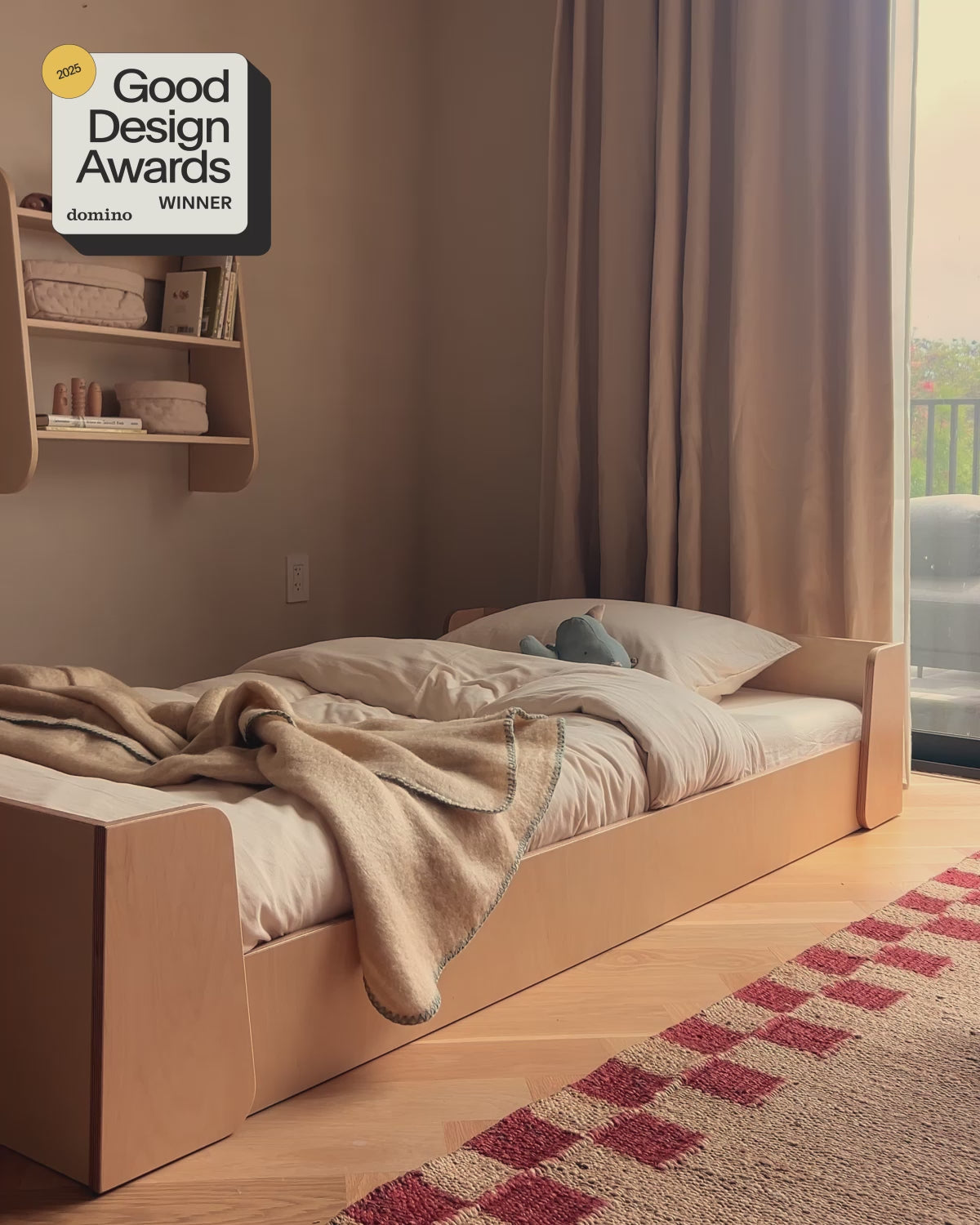 piccalio 2-in-1 toddler montessori floor bed transitioning between floor bed and raised bed and being jumped on by 4 year old.