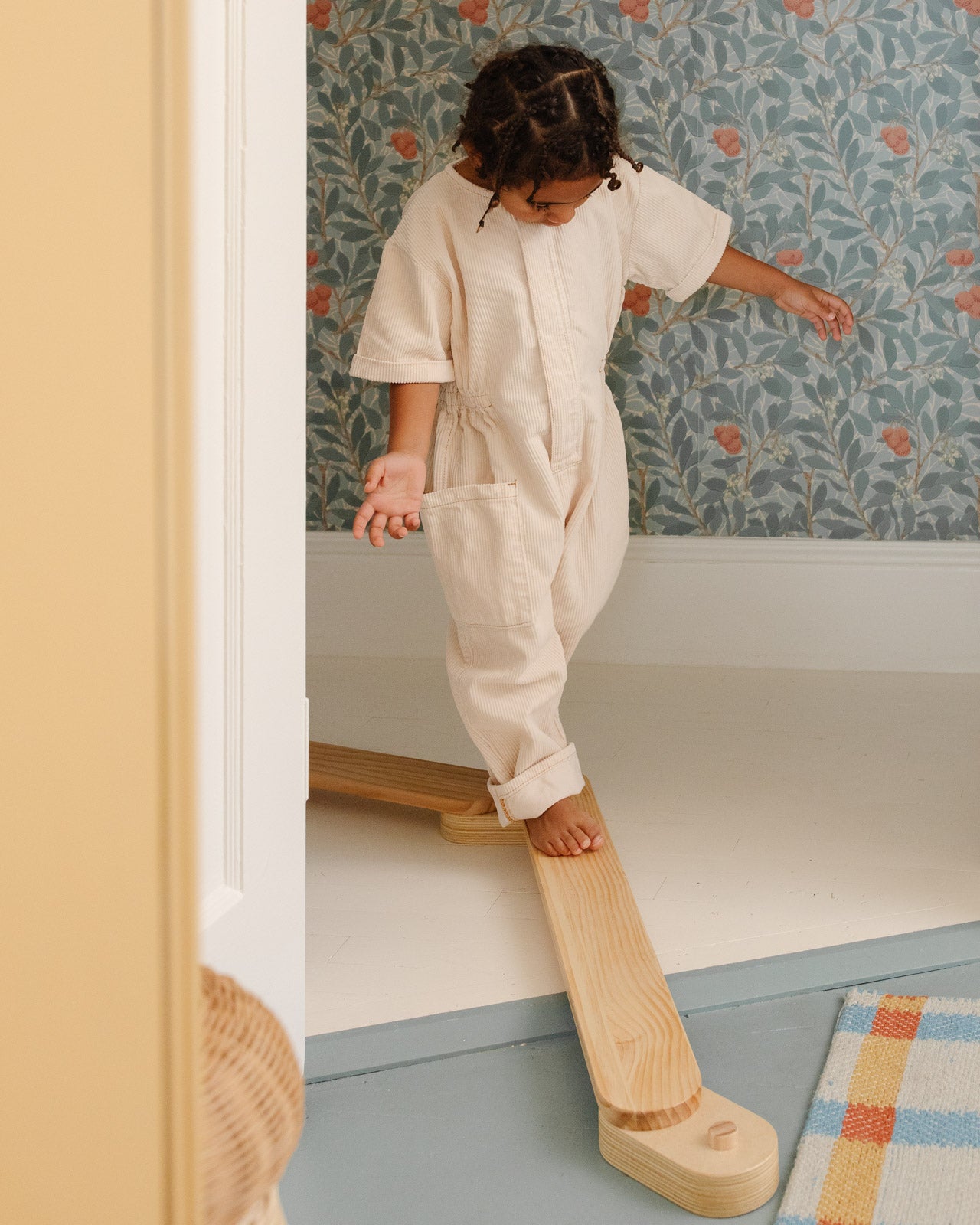 Child connecting Montessori Balance Beam for kids